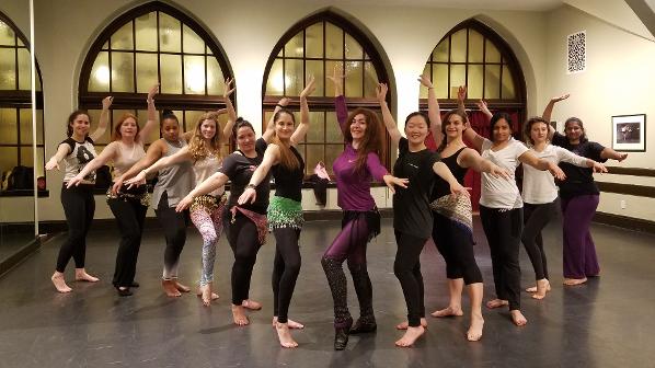 Seyyide and her belly dance students in the dance studio after belly dance class